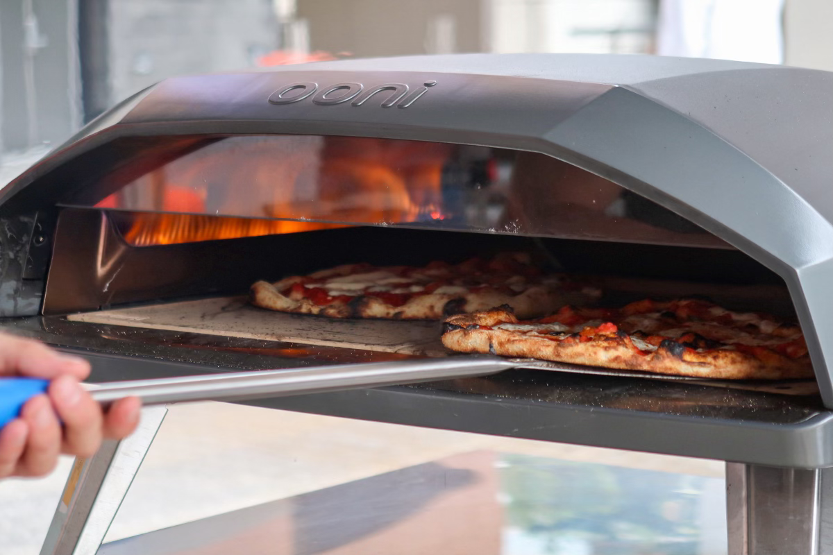 Pizza baking in the Ooni oven at 850°F